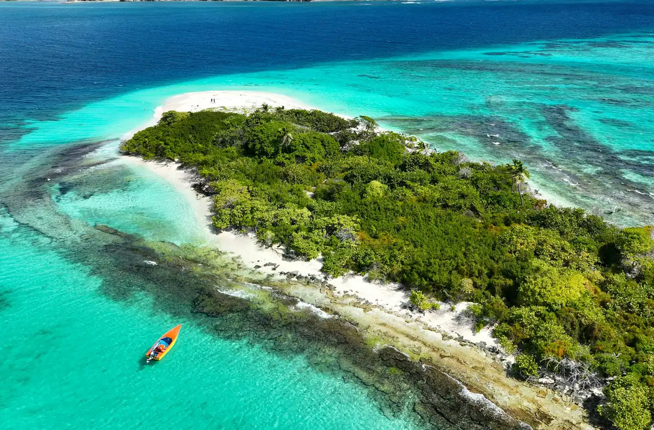 White Island off Carriacou, Grenada, ringed by white sand, coral reef and turquoise water